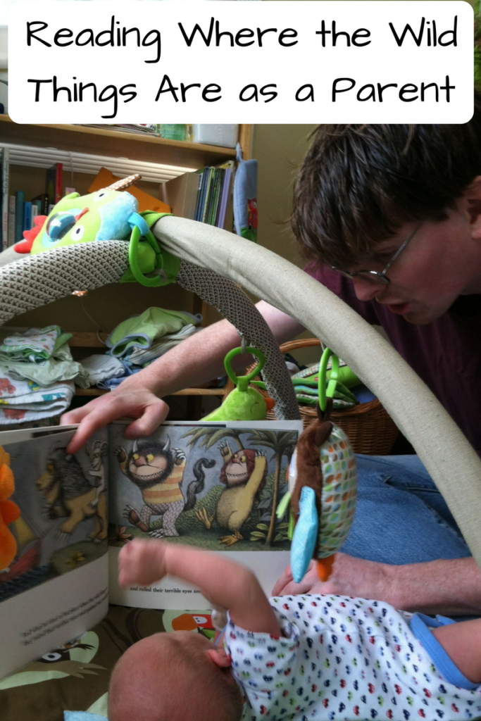 "Re-Reading Where the Wild Things Are as a Parent" Some books resonate with you as a child and then again in a totally different way as an adult. (Photo: Young man reading Where the Wild Things Are to a baby under a baby gym.)