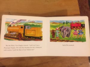 Photo from book The Little Engine that Could. Left-hand: The shiny engine tells the dolls and toys that he won't bring them because he's a passenger engine. Right side: Shows dolls and toys looking sad with text "And off he steamed."