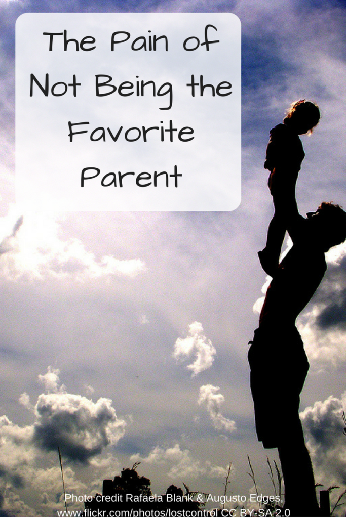 The Pain of Not Being the Favorite Parent (Photo: Silhouette of a parent lifting up a child)