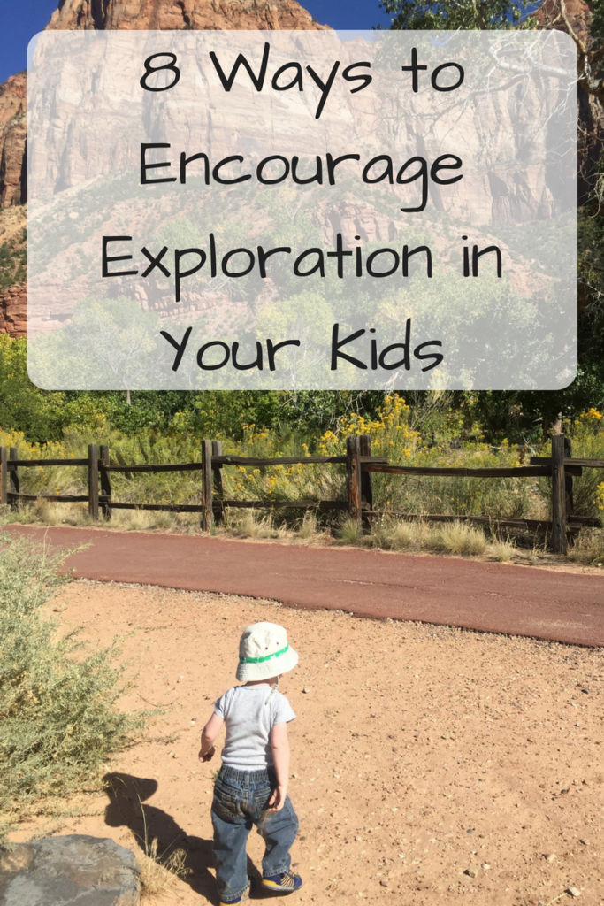 8 Ways to Encourage Exploration in Your Kids (Photo: Young white boy in a bucket hat standing in the sand in front of a mountain)