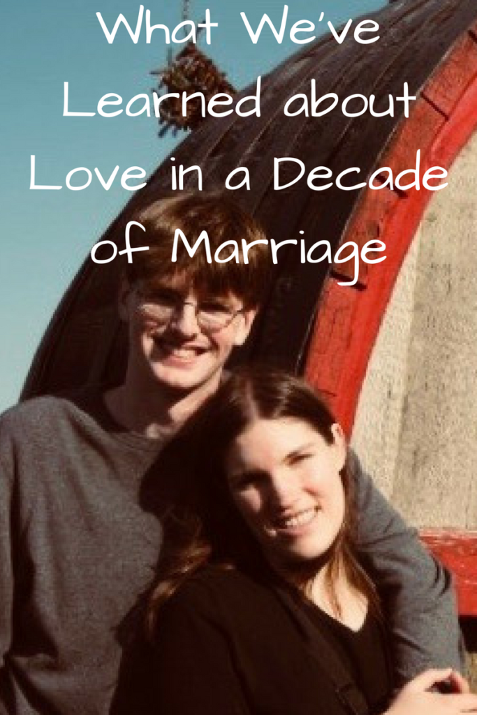What We've Learned about Love in a Decade of Marriage (Photo: Young white man and woman in sepia-tone standing in front of a giant wine barrel)
