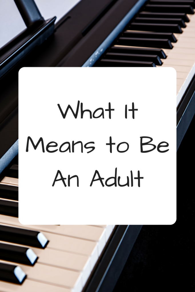 What It Means to Be An Adult. (Background: Piano keys)