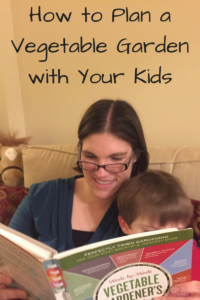 How to Plan a Vegetable Garden with Your Kids (Photo: White woman and white boy reading a book labeled Week By Week Vegetable Garden)