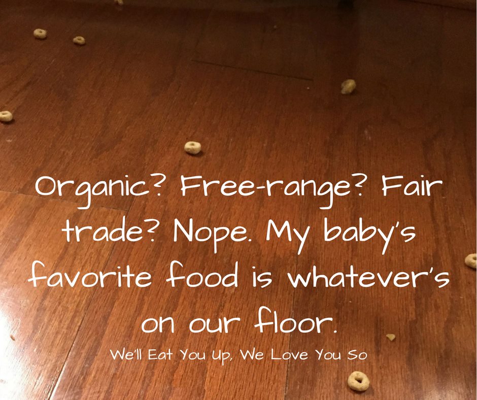 Organic? Free-range? Fair trade? Nope. My baby's favorite food is whatever's on our floor. (Photo: Wooden floor with cheerios on it)