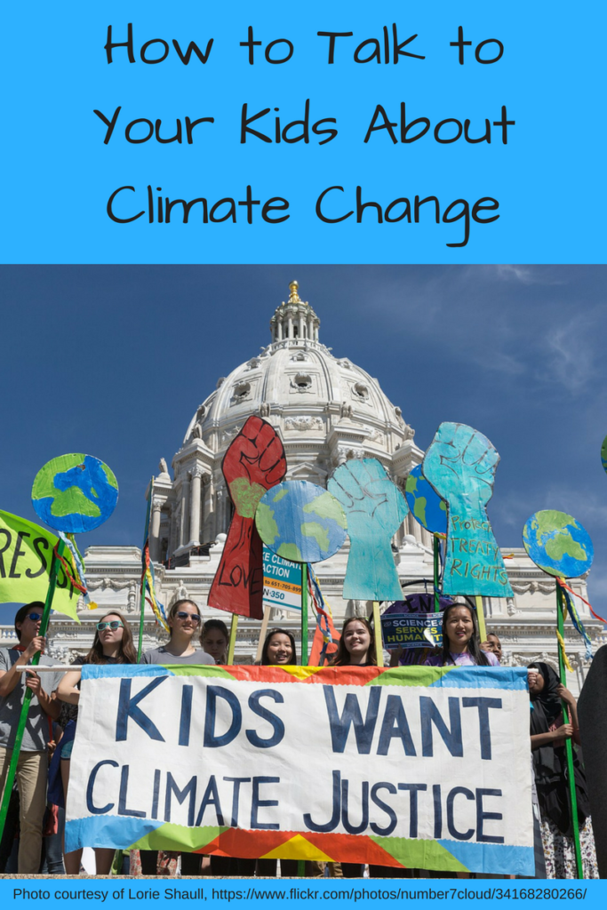 How to Talk to Kids About Climate Change (Photo: Group of kids in front of a capital building holding a poster saying 'Kids Want Climate Justice')