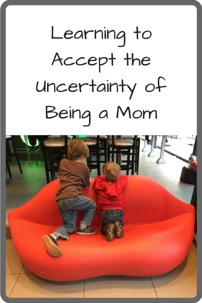 Learning to Accept the Uncertainty of Being a Mom (Photo: Two young boys sitting on a couch that looks like a giant pair of lips)