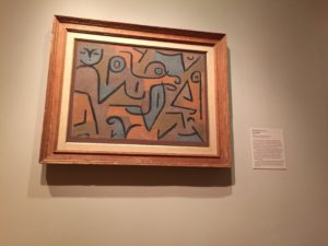 Photo of a Paul Klee painting of bold lines against a multi-colored background. 