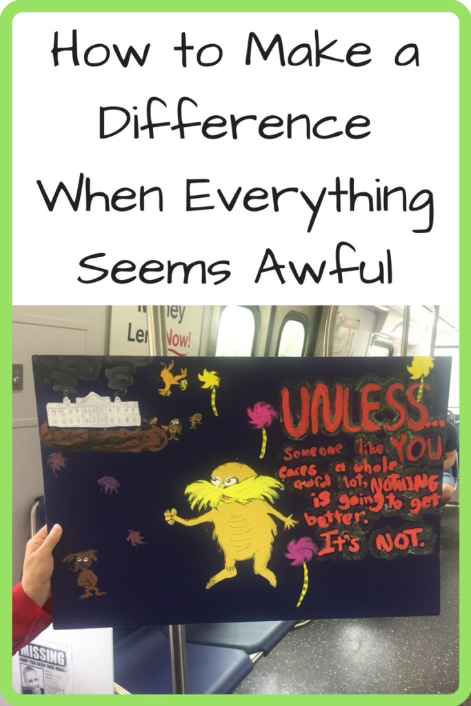 How to Make a Difference When Everything Seems Awful (Photo: Hand-painted sign of The Lorax with the quote 'Unless someone like you cares a whole lot, nothing will change, it's not.')