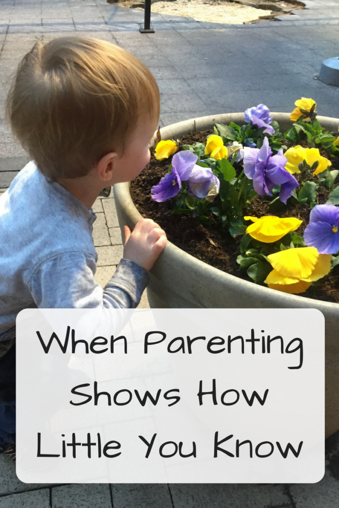 When Parenting Shows You How Little You Know (Photo: White young boy smelling flowers in a giant pot)