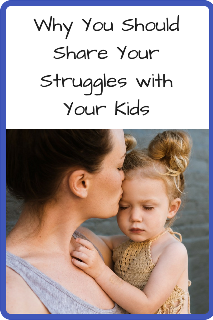 Why You Should Share Your Struggles with Your Kids (Photo: A woman kissing a child she is holding)