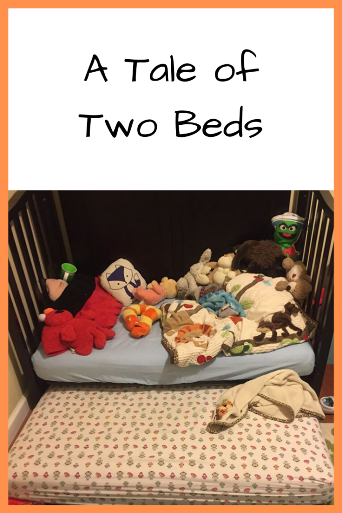 Photo: A child's bed filled with stuffed animals with another mattress in front of it
