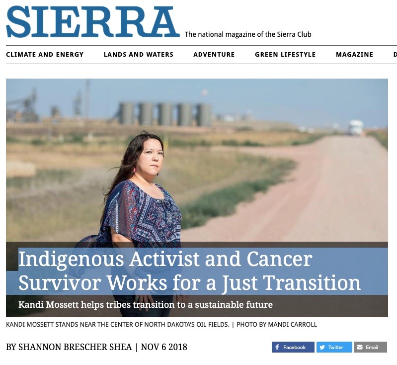 Screenshot from Sierra Magazine with title "Indigenous Activist and Cancer Survivor Works for a Just Transition" with photo of a Native American woman standing on the side of a dirt road