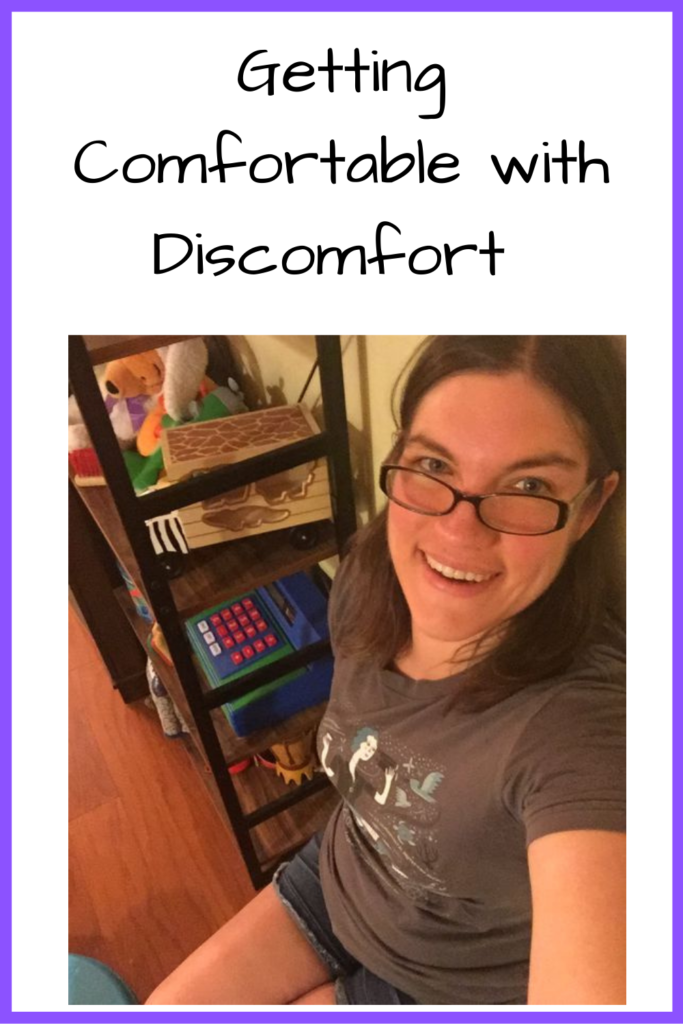 Text: Getting Comfortable with Discomfort; Photo: Selfie of a white woman doing a wall sit with a bookshelf in the background