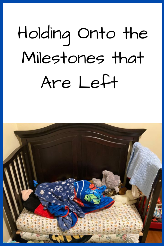 Holding Onto the Milestones that Are Left; Photo: Toddler bed covered in blankets