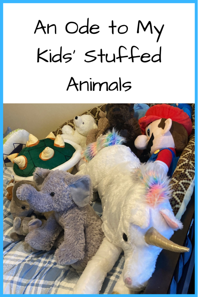 An Ode to My Kids' Stuffed Animals; photo with a pile of stuffed animals on a bed, including a polar bear, Bowser shell, Mario, elephants and a large unicorn
